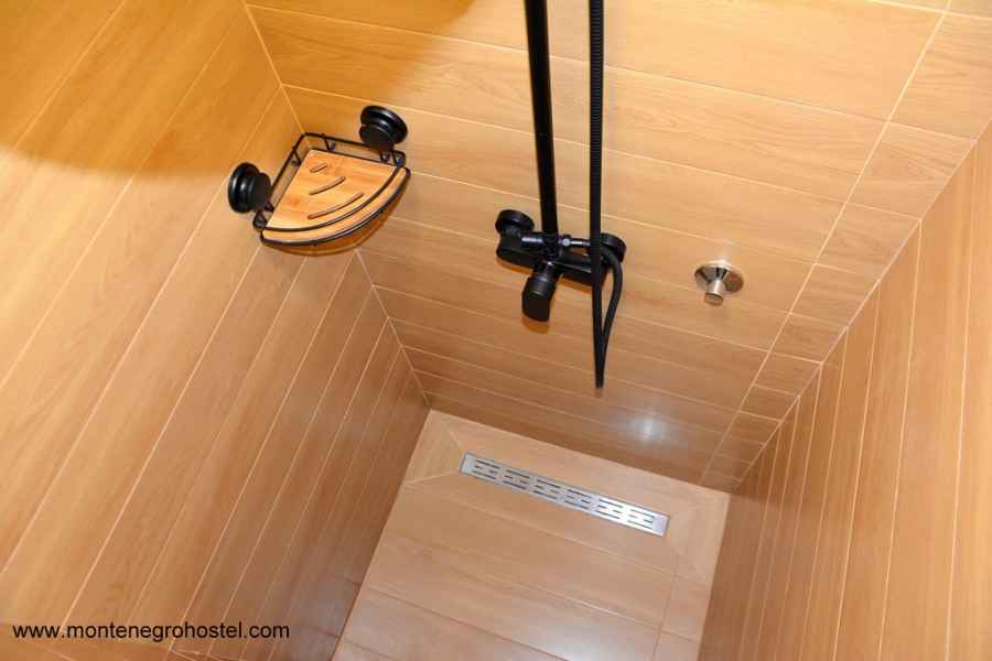 bathroom with showers